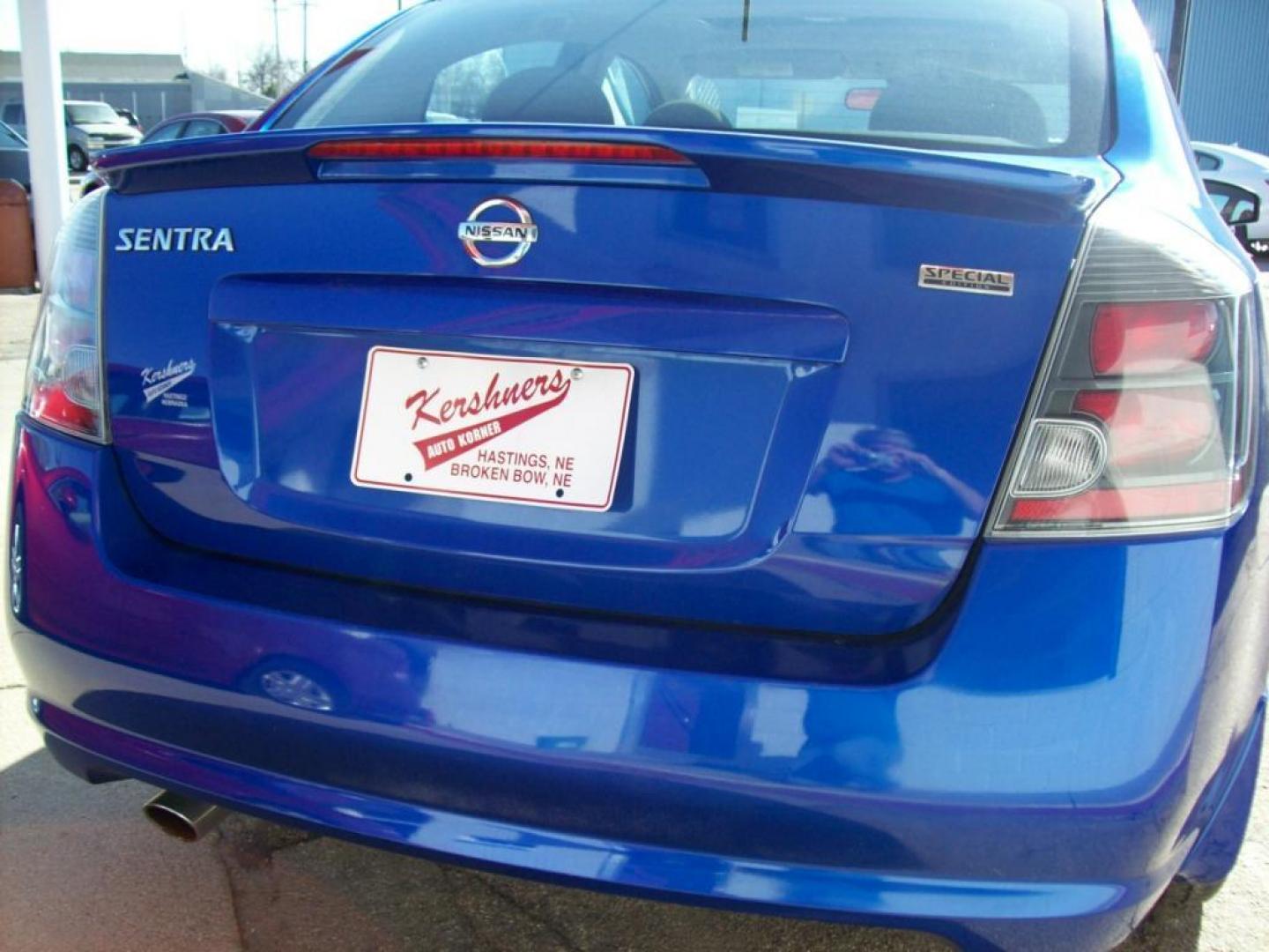 2011 Blue /Gray Nissan Sentra 2.0; 2.0 S; 2.0 SL; 2.0 SR (3N1AB6AP0BL) with an L4, 2.0L engine, Automatic transmission, located at 220 West South St., Hastings, NE, 68901, (402) 461-3161, 0.000000, 0.000000 - This is a Special Edition! Leather, AM-FM-CD, Navigation System, Satellite Radio - XM, Front Wheel Drive, Cruise Control, Power Windows and Locks, Rear Defrost, Power Driver's Seat, Split Back Seat, Alloy Wheels. - Photo#12