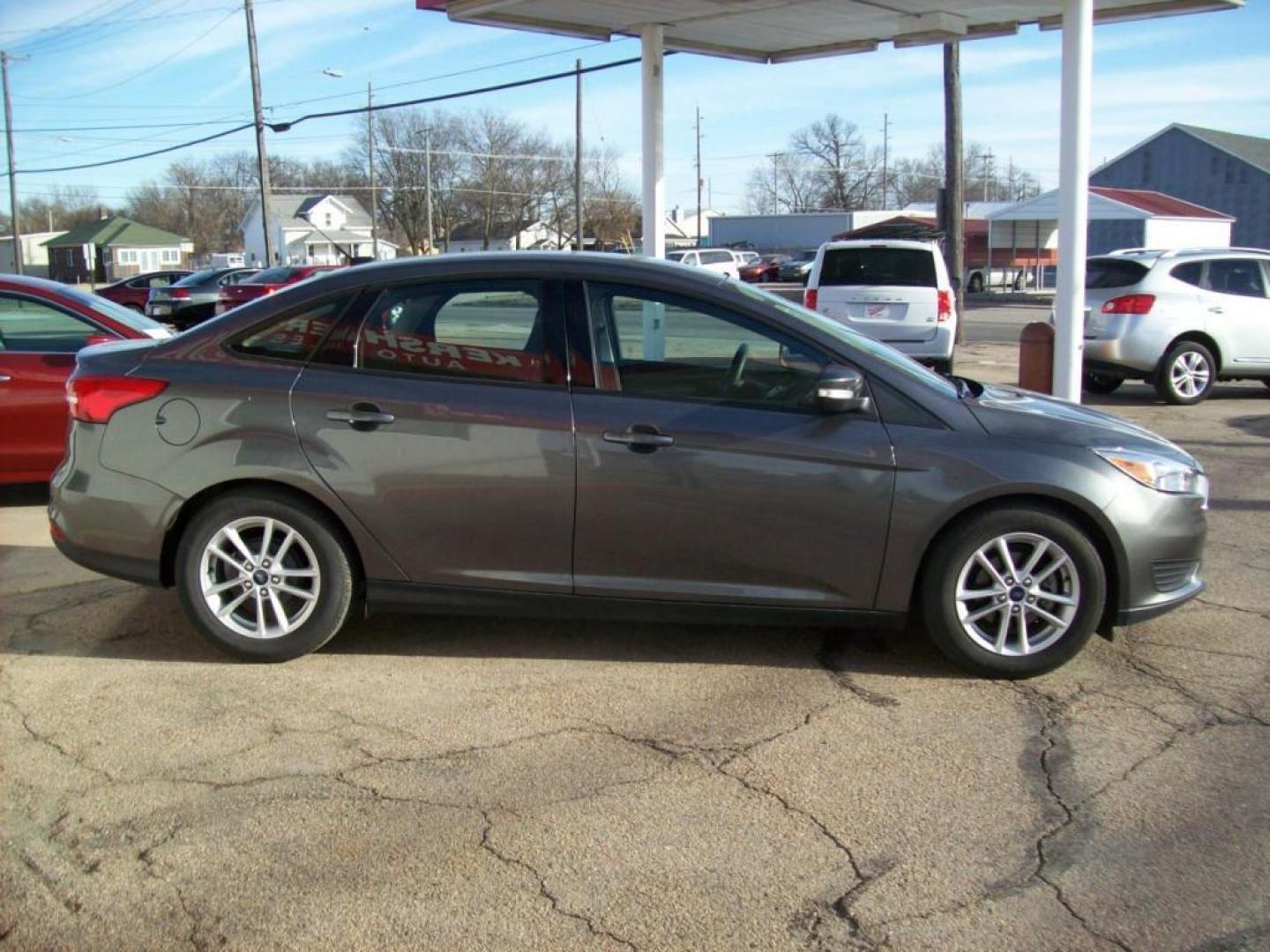 2015 Grey /Graphite Grey Ford Focus SE (1FADP3F21FL) with an L4, 2.0L; FFV engine, Automatic transmission, located at 220 West South St., Hastings, NE, 68901, (402) 461-3161, 0.000000, 0.000000 - Photo#8